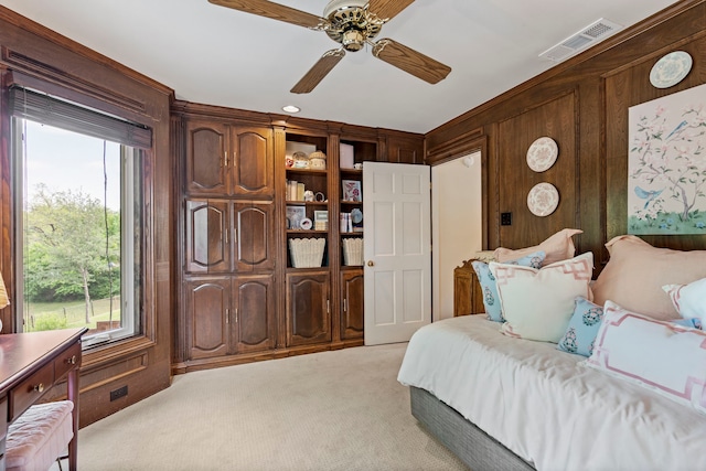 7215 Abrams Place Ct, Dallas, TX 75231 - bedroom featuring radiator, multiple windows, light carpet, wood walls, and a ceiling fan