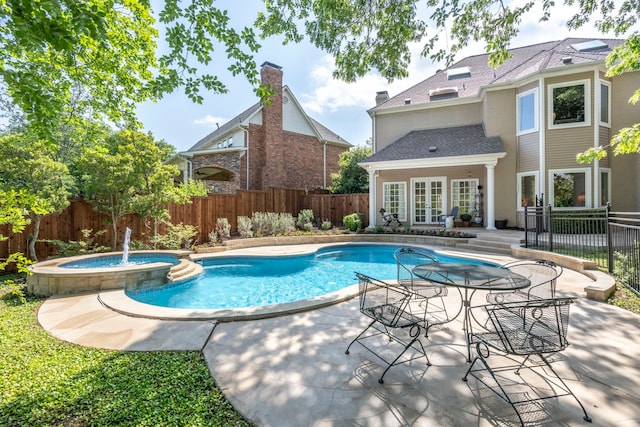 7215 Abrams Place Ct, Dallas, TX 75231 - view of pool featuring french doors, a fenced backyard, a patio area, and a pool with connected hot tub