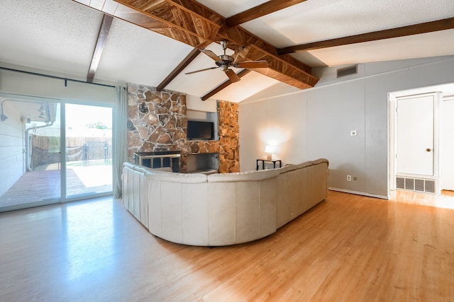 2123 Sunrise Trl, Richardson, TX 75081 - living area featuring light wood finished floors, ceiling fan, and a textured ceiling