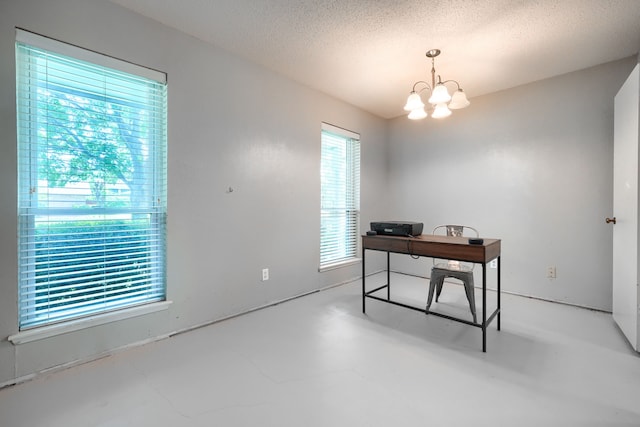 2123 Sunrise Trl, Richardson, TX 75081 - office space featuring a chandelier, a textured ceiling, and finished concrete flooring