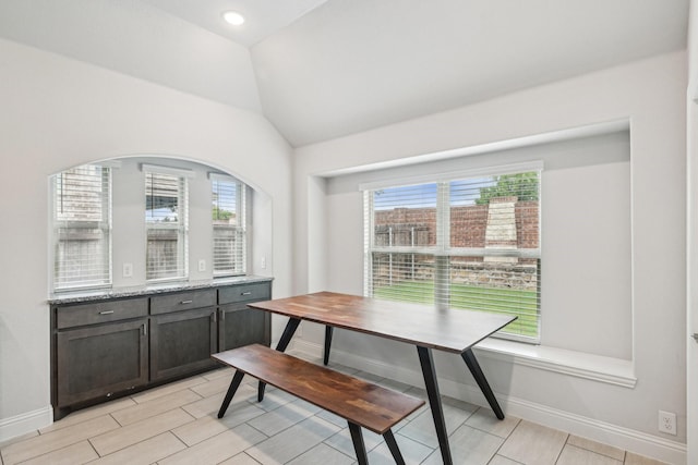 1512 Nighthawk Ln, Mansfield, TX 76063 - dining room with plenty of natural light, baseboards, vaulted ceiling, and breakfast area