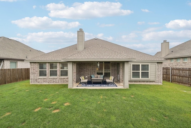 1512 Nighthawk Ln, Mansfield, TX 76063 - back of house with outdoor lounge area, brick siding, a patio area, and roof with shingles