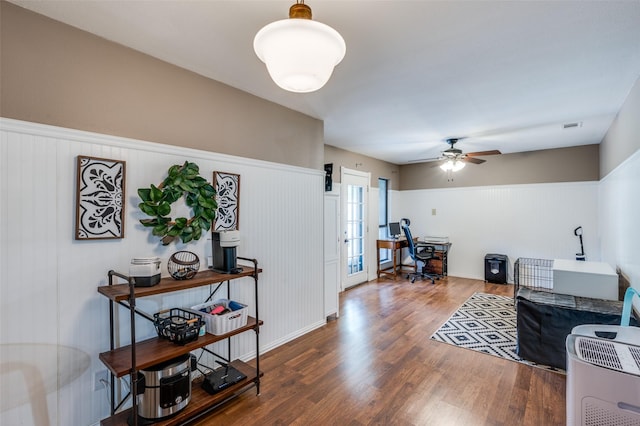2401 Kingston Trce, Denton, TX 76209 - living area with an office area, wood finished floors, a ceiling fan, and wainscoting