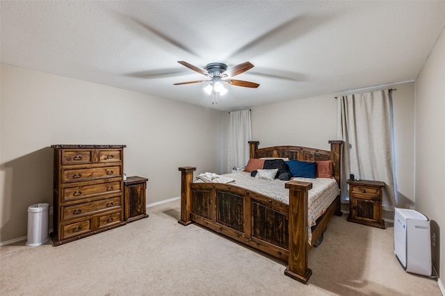 2401 Kingston Trce, Denton, TX 76209 - bedroom with carpet flooring, a ceiling fan, and baseboards