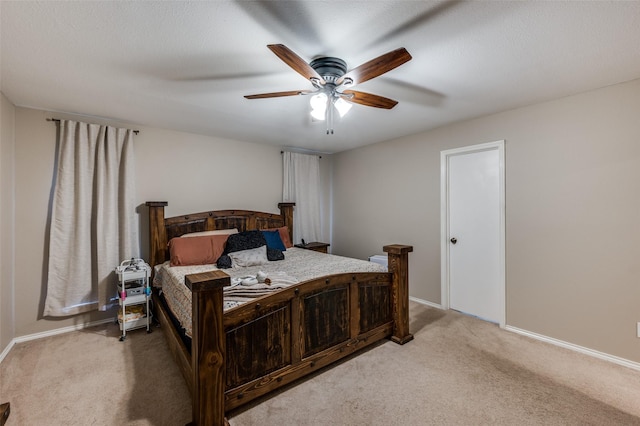 2401 Kingston Trce, Denton, TX 76209 - bedroom featuring light colored carpet, baseboards, and a ceiling fan