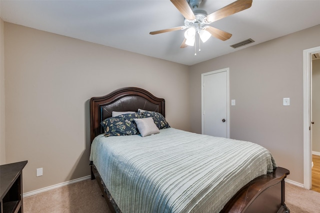 2401 Kingston Trce, Denton, TX 76209 - carpeted bedroom featuring baseboards and a ceiling fan