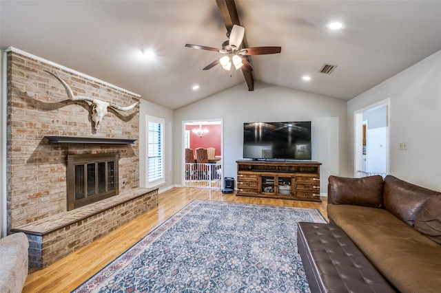 2401 Kingston Trce, Denton, TX 76209 - living area featuring wood finished floors, a brick fireplace, a ceiling fan, recessed lighting, and baseboards