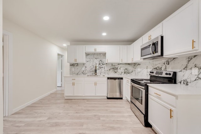 4901 Wilmington Dr, Fort Worth, TX 76107 - kitchen featuring stainless steel appliances, backsplash, recessed lighting, light countertops, and a sink