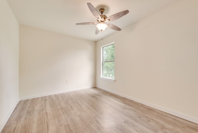 4901 Wilmington Dr, Fort Worth, TX 76107 - unfurnished room with light wood-style floors, ceiling fan, and baseboards