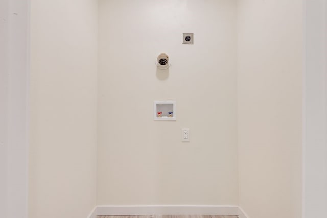 4901 Wilmington Dr, Fort Worth, TX 76107 - laundry room with hookup for an electric dryer, hookup for a washing machine, and baseboards