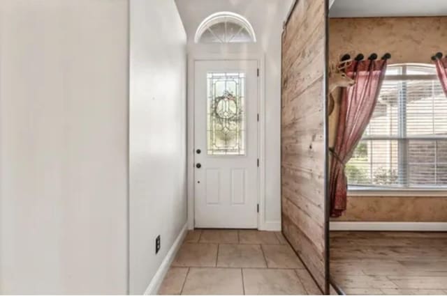1104 Killian Dr, Mansfield, TX 76063 - entryway with baseboards and wooden walls
