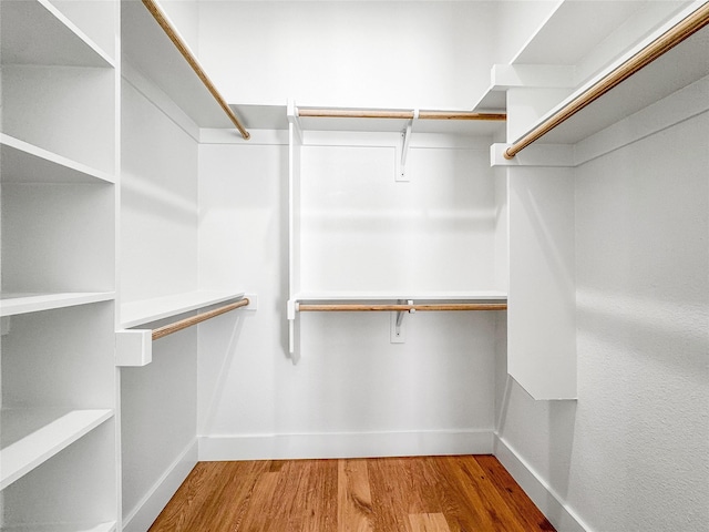 2417 Merlin St, Dallas, TX 75215 - spacious closet with wood finished floors