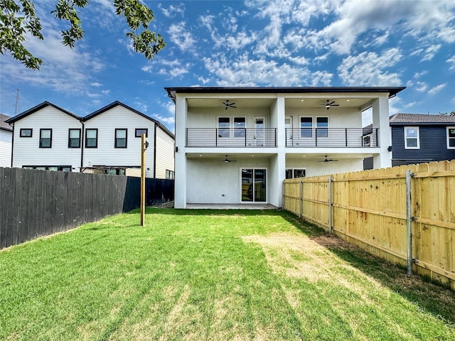 2417 Merlin St, Dallas, TX 75215 - rear view of property with a ceiling fan, stucco siding, and a balcony