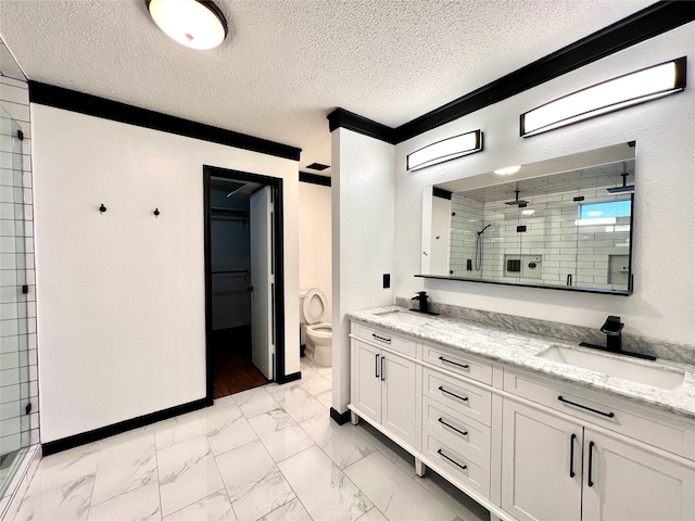 608 Marbury Way, Wylie, TX 75098 - full bathroom with marble finish flooring, a stall shower, double vanity, toilet, and a textured ceiling