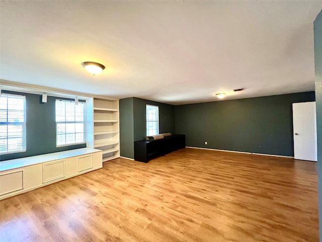 608 Marbury Way, Wylie, TX 75098 - unfurnished living room with light wood-style flooring