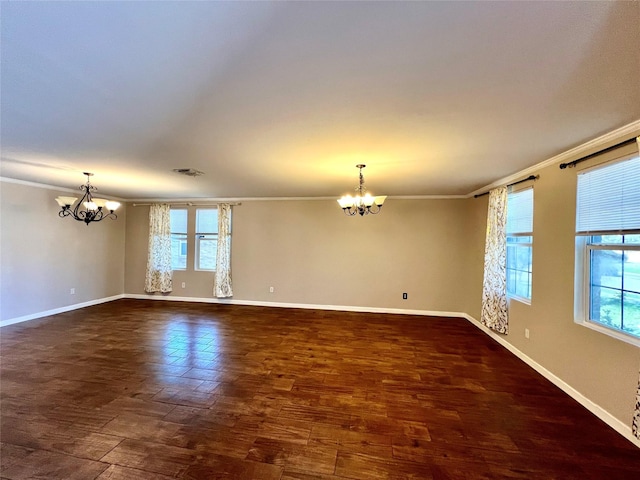 608 Marbury Way, Wylie, TX 75098 - empty room with a chandelier, crown molding, baseboards, and dark wood-type flooring