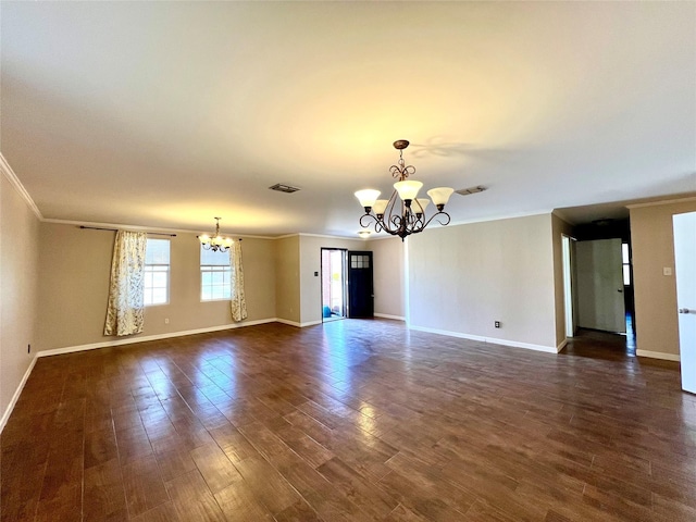 608 Marbury Way, Wylie, TX 75098 - empty room featuring a chandelier, crown molding, baseboards, and dark wood finished floors
