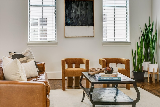 2123 Diversey St, Dallas, TX 75201 - living area with plenty of natural light, wood finished floors, and baseboards