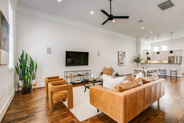 2123 Diversey St, Dallas, TX 75201 - living room with recessed lighting, crown molding, ceiling fan, dark wood finished floors, and baseboards