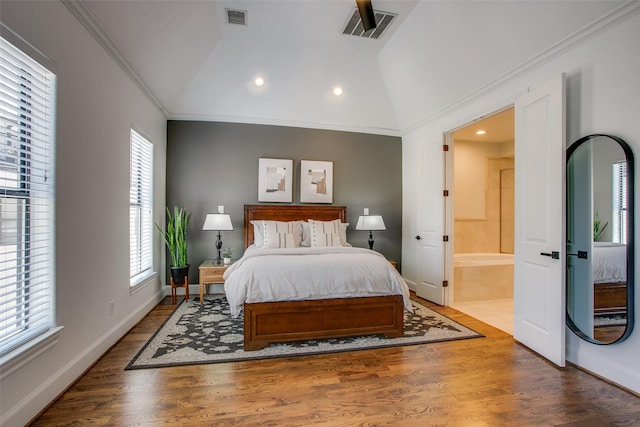 2123 Diversey St, Dallas, TX 75201 - bedroom with vaulted ceiling, crown molding, connected bathroom, wood finished floors, and recessed lighting