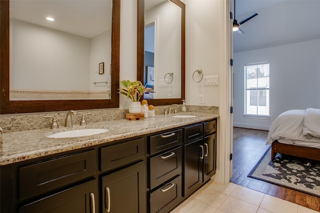 2123 Diversey St, Dallas, TX 75201 - bathroom with double vanity, ensuite bath, and tile patterned flooring