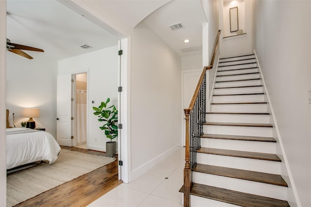 2123 Diversey St, Dallas, TX 75201 - stairs with ceiling fan, recessed lighting, tile patterned floors, and baseboards