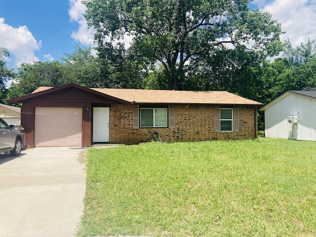 3605 Delia St, Rowlett, TX 75088 - single story home featuring an attached garage, concrete driveway, a front lawn, and brick siding