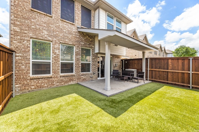 974 Mikaela Dr, Allen, TX 75013 - rear view of property with brick siding and a patio area