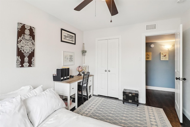 3713 Fairfield Dr, Carrollton, TX 75007 - bedroom with dark wood finished floors, a closet, baseboards, a ceiling fan, and a desk