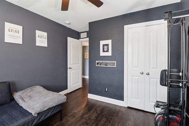 3713 Fairfield Dr, Carrollton, TX 75007 - living area with wood finished floors, a ceiling fan, baseboards, and a textured wall