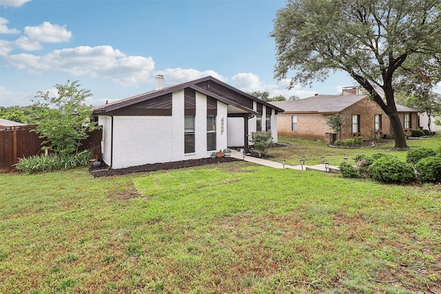3713 Fairfield Dr, Carrollton, TX 75007 - back of property with brick siding