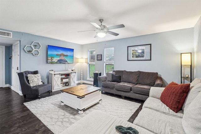 3713 Fairfield Dr, Carrollton, TX 75007 - living area featuring ceiling fan, dark wood-type flooring, and baseboards
