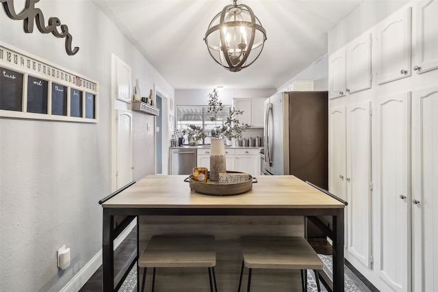 3713 Fairfield Dr, Carrollton, TX 75007 - dining space with a chandelier and baseboards