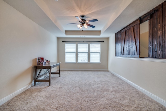 4301 Spruce Rd, Melissa, TX 75454 - hallway with a raised ceiling, light carpet, and baseboards