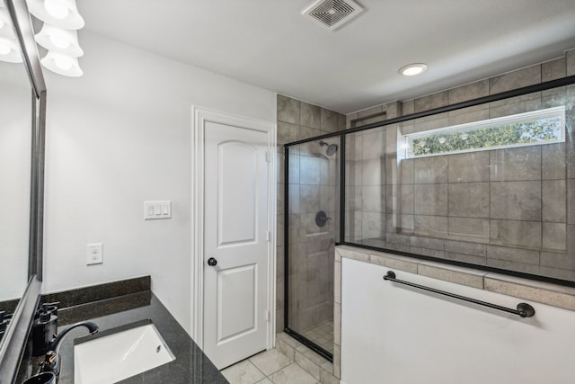 1124 Wishing Well Ct, Cedar Hill, TX 75104 - bathroom with a shower stall, vanity, and tile patterned floors