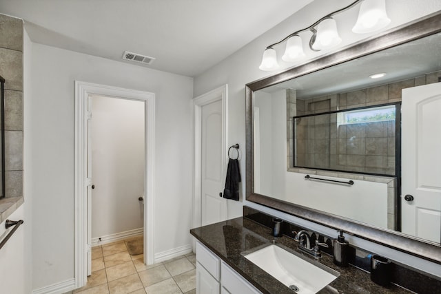 1124 Wishing Well Ct, Cedar Hill, TX 75104 - bathroom featuring vanity, baseboards, and tile patterned flooring