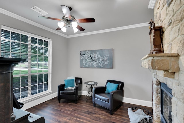 5 Remington Ct, Red Oak, TX 75154 - living area with a stone fireplace, ceiling fan, ornamental molding, wood finished floors, and baseboards