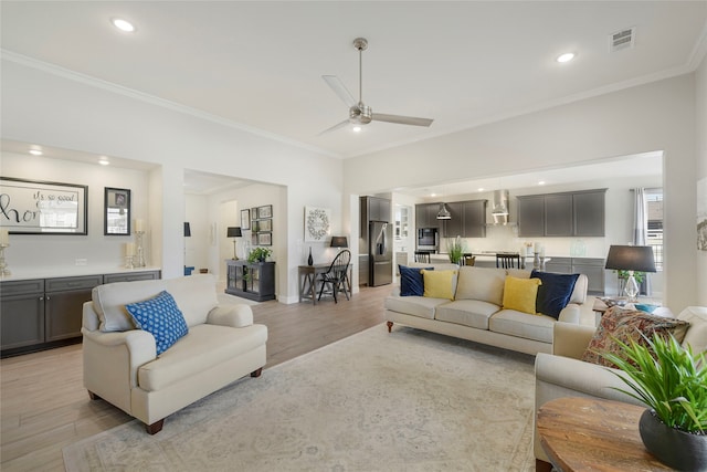 10020 Crestview Dr, Denton, TX 76207 - living room with light wood-type flooring, ornamental molding, recessed lighting, a ceiling fan, and baseboards