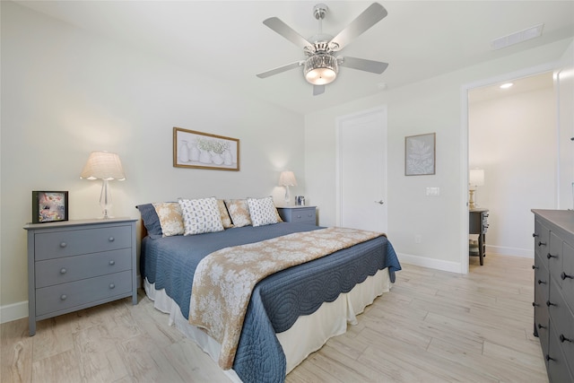 10020 Crestview Dr, Denton, TX 76207 - bedroom featuring baseboards, light wood-style flooring, and ceiling fan