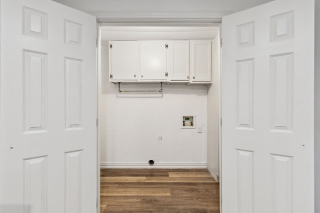 1103 Bowman St, Irving, TX 75060 - washroom featuring washer hookup, cabinet space, dark wood-type flooring, baseboards, and electric dryer hookup