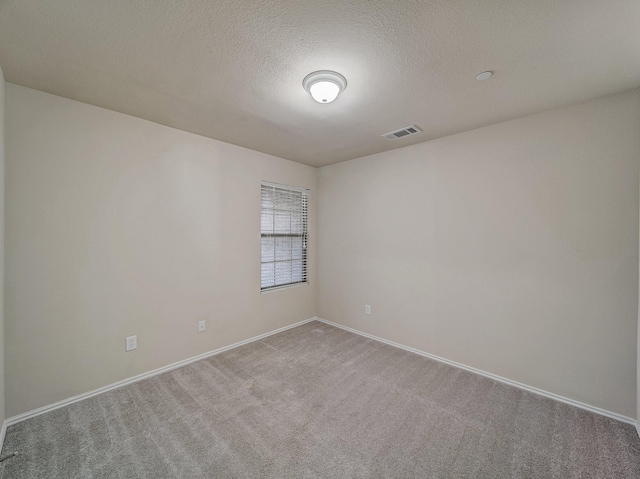 1159 Landon Ln, Allen, TX 75013 - carpeted empty room featuring baseboards and a textured ceiling