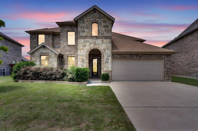 1708 Stillwater Dr, Burleson, TX 76028 - french provincial home with an attached garage, stone siding, concrete driveway, and a lawn
