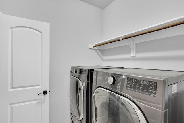 1708 Stillwater Dr, Burleson, TX 76028 - laundry area with washing machine and clothes dryer