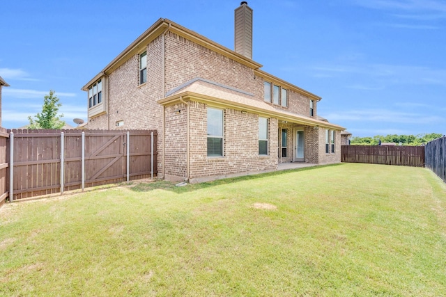 1708 Stillwater Dr, Burleson, TX 76028 - rear view of property with a chimney and brick siding