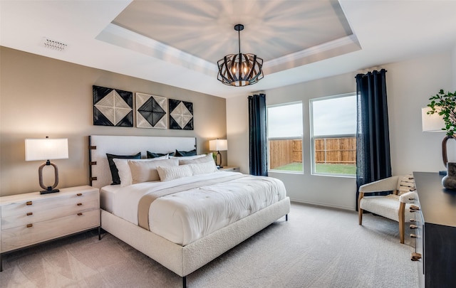2402 Carlow Ln, Lowry Crossing, TX 75407 - bedroom featuring a tray ceiling, light carpet, a chandelier, and baseboards