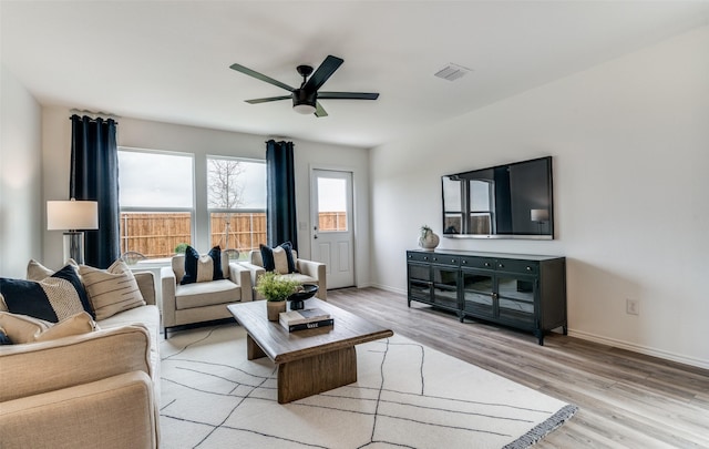 2402 Carlow Ln, Lowry Crossing, TX 75407 - living area featuring light wood-style flooring, a ceiling fan, and baseboards