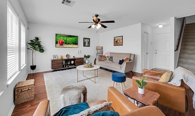 6608 Costa Dr, Waco, TX 76712 - living room featuring stairway, a ceiling fan, baseboards, and plenty of natural light