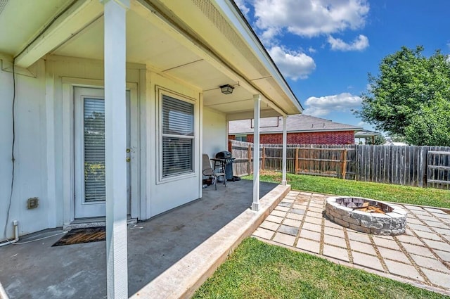6608 Costa Dr, Waco, TX 76712 - view of patio with a fire pit and a grill