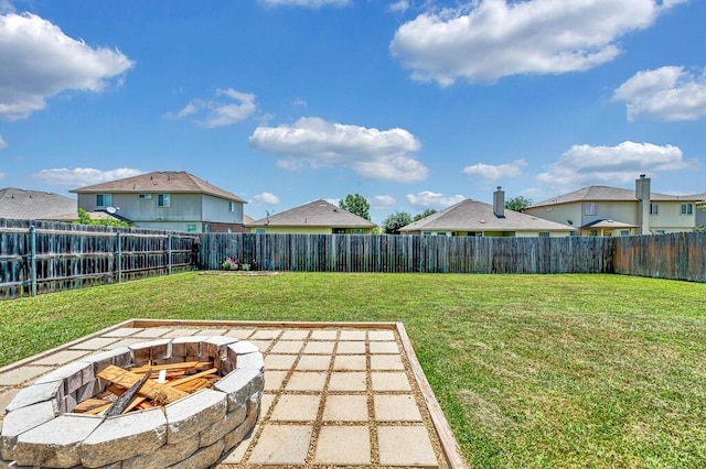 6608 Costa Dr, Waco, TX 76712 - view of yard featuring an outdoor fire pit and a patio area