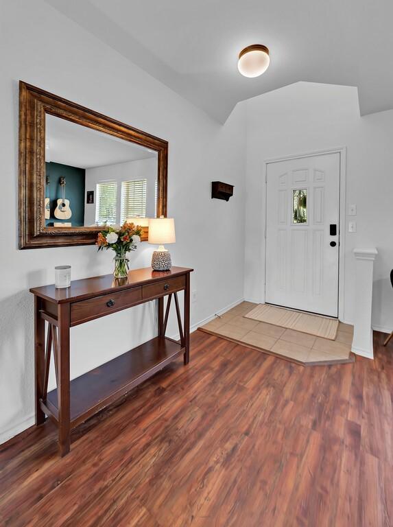 6608 Costa Dr, Waco, TX 76712 - foyer with wood finished floors and baseboards